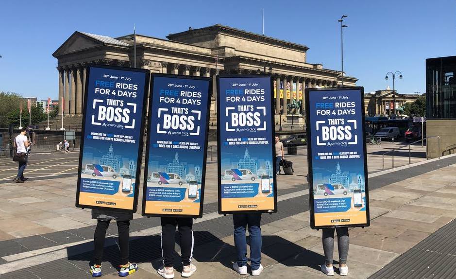 Arriva travel offer on human billboard displays in Liverpool